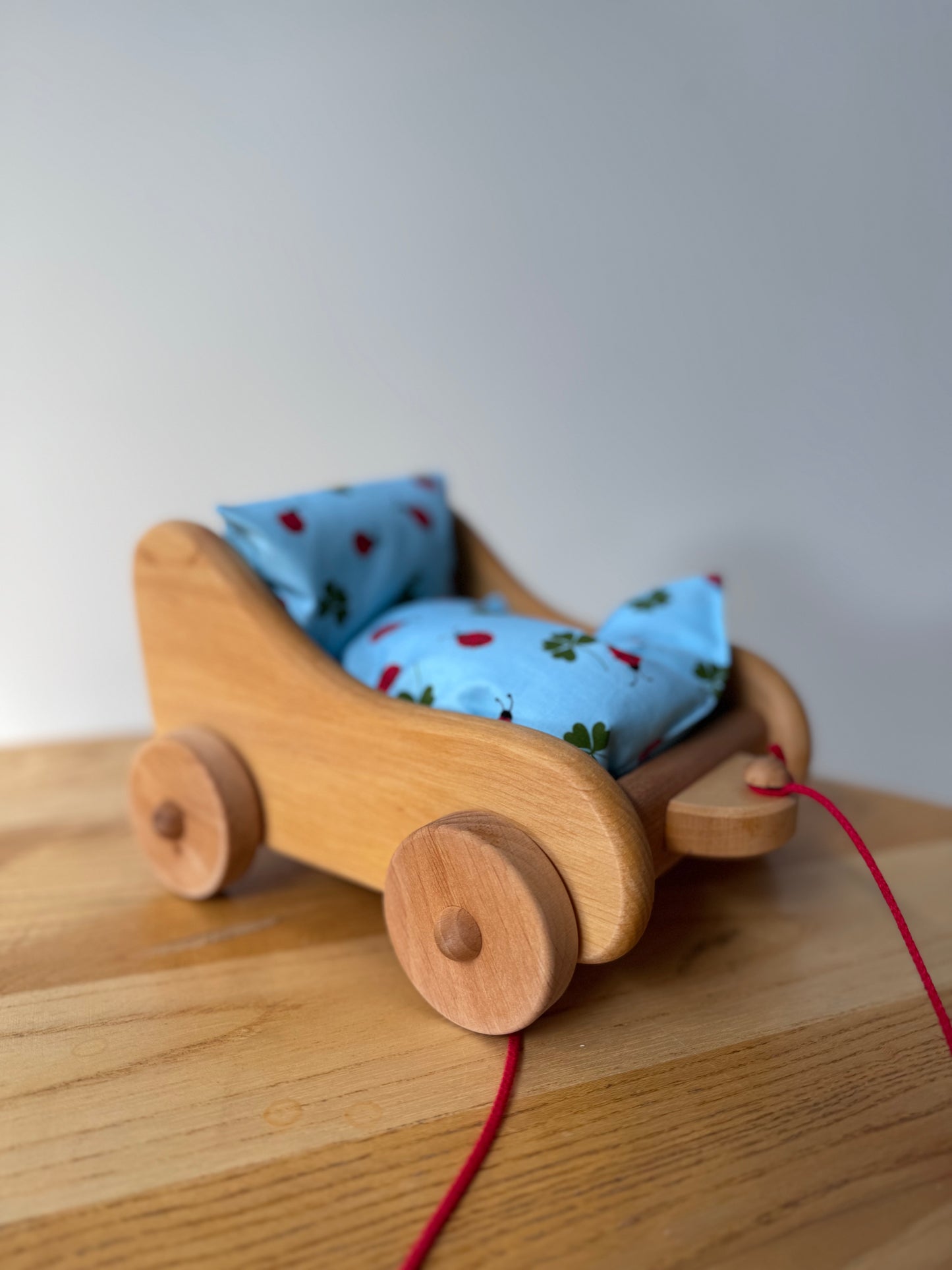 Children's Wooden Tow Around Doll Trolley